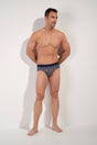 Full-body view of a men model wearing HO navy print modal/viscose/tencel Mini Briefs