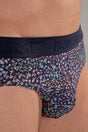 Close-up view of a men model wearing HO navy print modal/viscose/tencel Mini Briefs