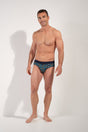 Full-body view of a men model wearing HO blue print modal/viscose/tencel Briefs HO1