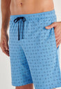 General view of a men model wearing HO blue print cotton Short Sleepwear