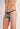 Close-up view of a men model wearing HO blue print  G-String