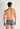 Back view of a men model wearing HO blue print  Trunk