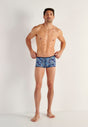 Full-body view of a men model wearing HO blue print  Trunk