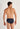 Back view of a men model wearing HO navy print modal/viscose/tencel Comfort Briefs