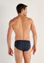 Back view of a men model wearing HO navy print modal/viscose/tencel Comfort Briefs