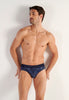 Front view of a men model wearing HO navy print modal/viscose/tencel Mini Briefs