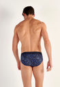 Back view of a men model wearing HO navy print modal/viscose/tencel Mini Briefs