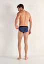 General view of a men model wearing HO navy print modal/viscose/tencel Mini Briefs