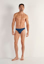 Full-body view of a men model wearing HO blue print  Comfort Micro Briefs