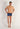 Full-body view of a men model wearing HO blue print  Trunk
