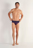 Full-body view of a men model wearing HO navy print modal/viscose/tencel Briefs HO1