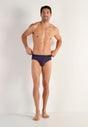 Full-body view of a men model wearing HO navy print modal/viscose/tencel Briefs HO1