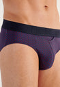 Close-up view of a men model wearing HO navy print modal/viscose/tencel Briefs HO1