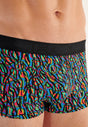 Close-up view of a men model wearing HO multico print  Trunk