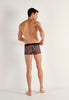 General view of a men model wearing HO black/red  Trunk