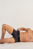 General view of a men model wearing HO black print modal/viscose/tencel Boxer Briefs