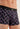 Close-up view of a men model wearing HO black print modal/viscose/tencel Boxer Briefs