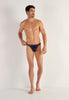 Full-body view of a men model wearing HO navy  G-String