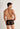 Back view of a men model wearing HO black  Trunk