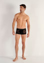 Full-body view of a men model wearing HO black  Trunk