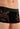 Close-up view of a men model wearing HO black  Trunk