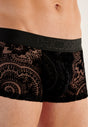 Close-up view of a men model wearing HO black  Trunk