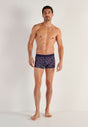 Full-body view of a men model wearing HO navy print  Boxer Briefs