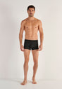 Full-body view of a men model wearing HO black print modal/viscose/tencel Boxer Briefs HO1
