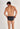 Back view of a men model wearing HO navy check modal/viscose/tencel Mini Briefs