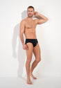 General view of a men model wearing HO black/blue/white cotton Mini Briefs 3p