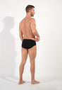 General view of a men model wearing HO black/blue/white cotton Mini Briefs 3p