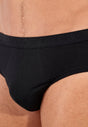 General view of a men model wearing HO black/blue/white cotton Mini Briefs 3p