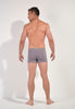 General view of a men model wearing HO black/grey/grey cotton Boxer Briefs 3p
