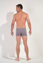 General view of a men model wearing HO black/grey/grey cotton Boxer Briefs 3p