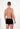 General view of a men model wearing HO black/blue/white cotton Boxer Briefs 3p