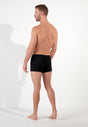 General view of a men model wearing HO black/blue/white cotton Boxer Briefs 3p