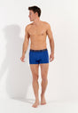 General view of a men model wearing HO navy/bright blue cotton Boxer Briefs HO1 2p