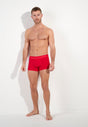 Full-body view of a men model wearing HO red  Boxer Briefs