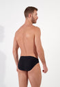 Back view of a men model wearing HO black  Comfort Micro Briefs