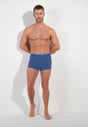 Full-body view of a men model wearing HO jeans blue cotton Boxer Briefs