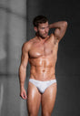 Full-body view of a men model wearing HO white cotton Comfort Micro Briefs