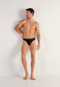 Full-body view of a men model wearing HO black cotton Mini Briefs