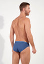 Back view of a men model wearing HO jeans blue cotton Mini Briefs