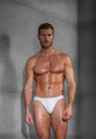Full-body view of a men model wearing HO white cotton Tanga Briefs