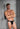 Full-body view of a men model wearing HO black cotton Tanga Briefs