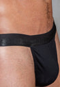 Close-up view of a men model wearing HO black cotton Tanga Briefs