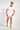 Full-body view of a men model wearing HO white cotton Tee-Shirt V Neck