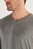 Close-up view of a men model wearing HO grey  L/SLV Shirt V-Neck