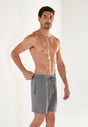 Front view of a men model wearing HO grey  Shorts
