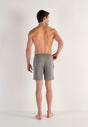 General view of a men model wearing HO grey  Shorts
